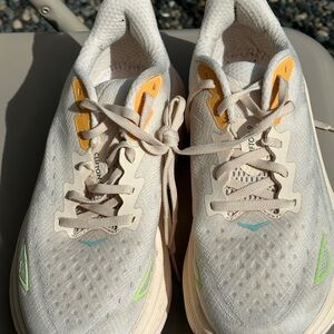 White and Yellow Athletic Sneakers